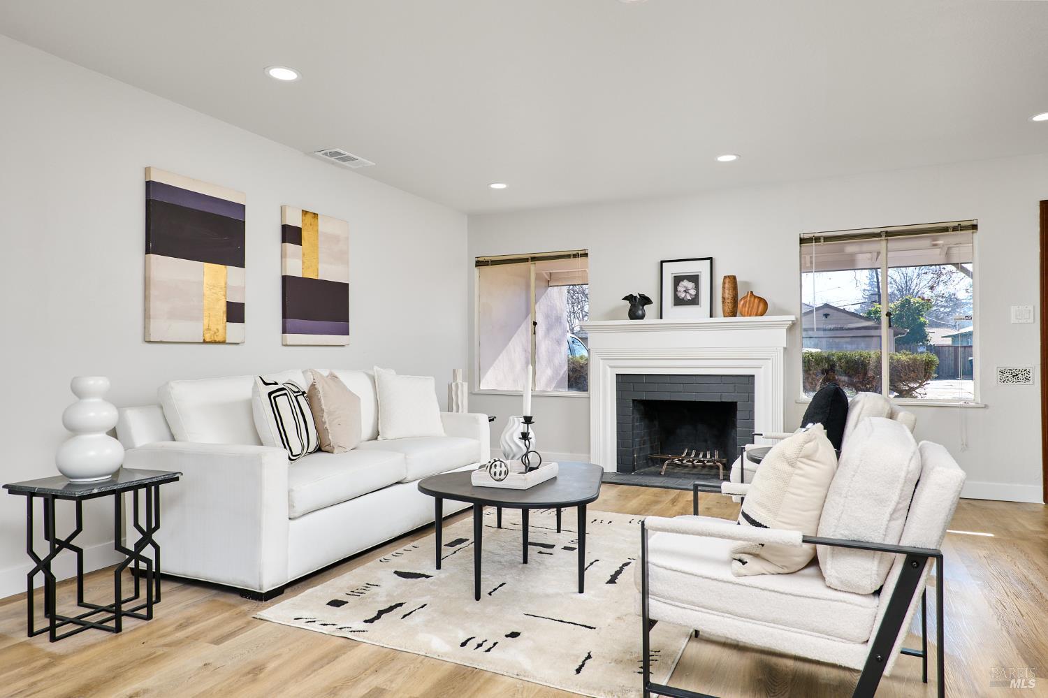 736 Nevada Street Fairfield, CA 94533 - Photo 4 of 36 a living room with furniture a fireplace and a table