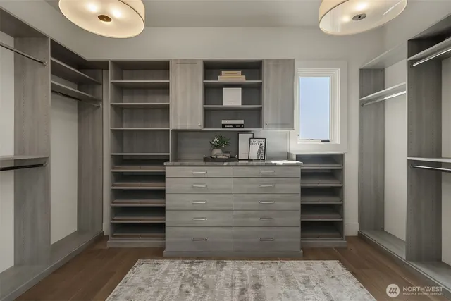 a kitchen with a refrigerator and cabinets