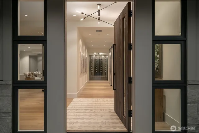a view of a hallway with a glass door