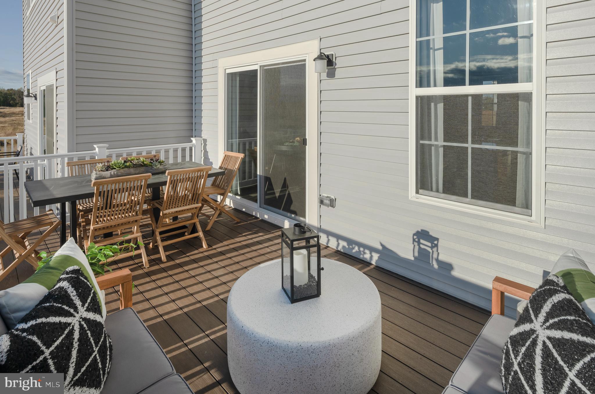 121 Swan Field Ranson, PA 25438 - Photo 15 of 35 a view of a chairs and table in the balcony
