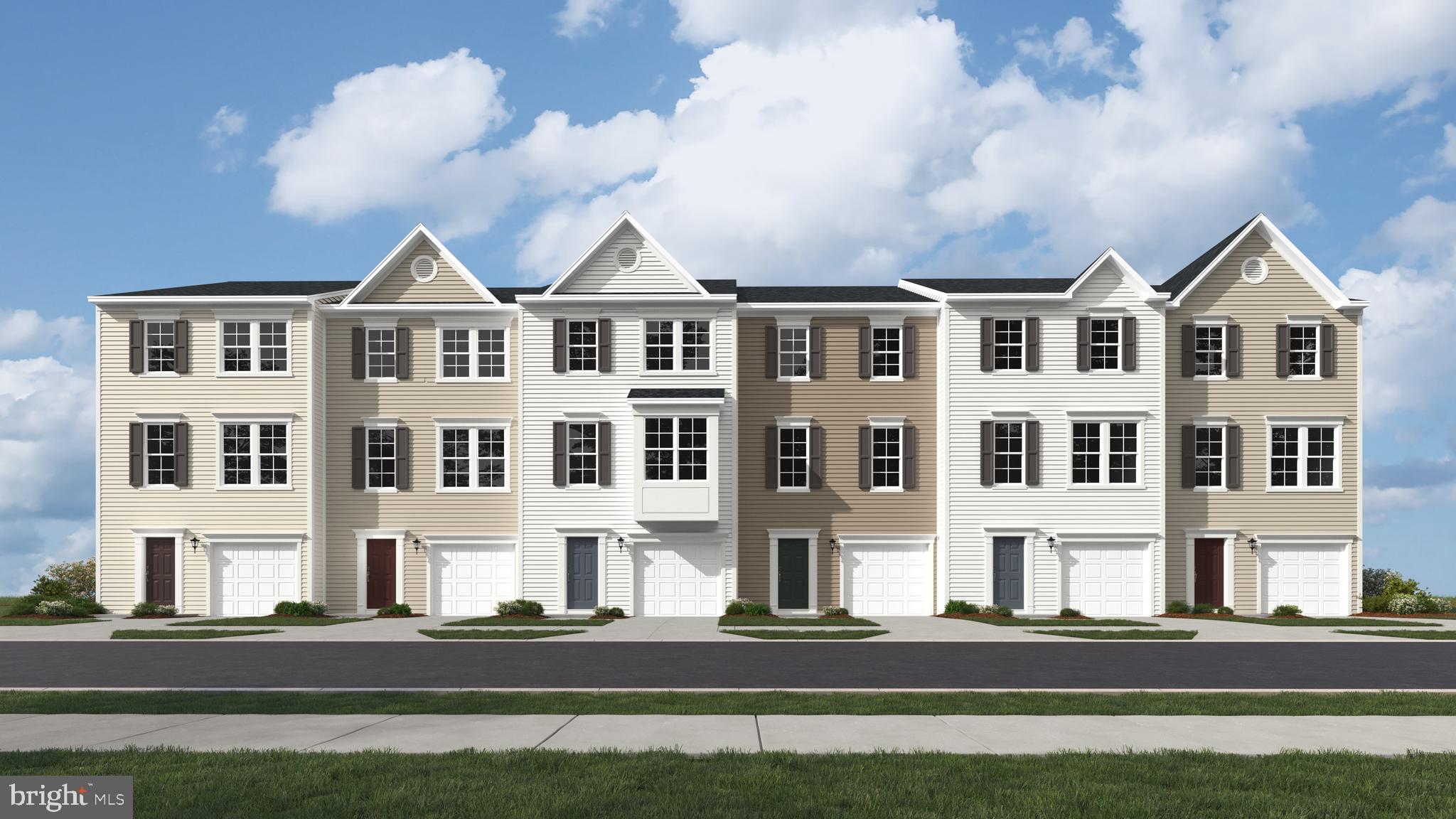 121 Swan Field Ranson, PA 25438 - Photo 35 of 35 a front view of a residential apartment building with a yard