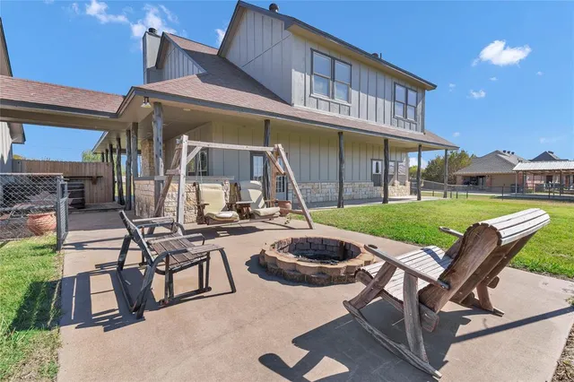 a view of a house with backyard porch and patio