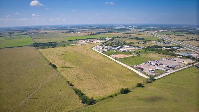 a view of a lake and a yard