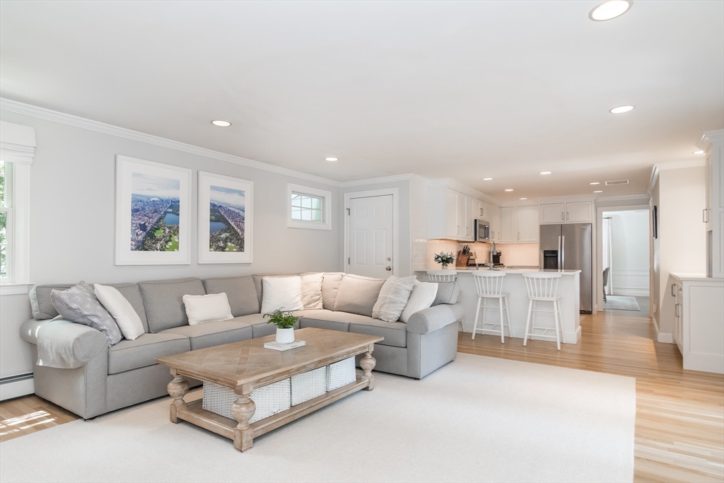 31 Martin Road Wellesley, MA 02481 - Photo 11 of 28 a living room with furniture and a view of kitchen