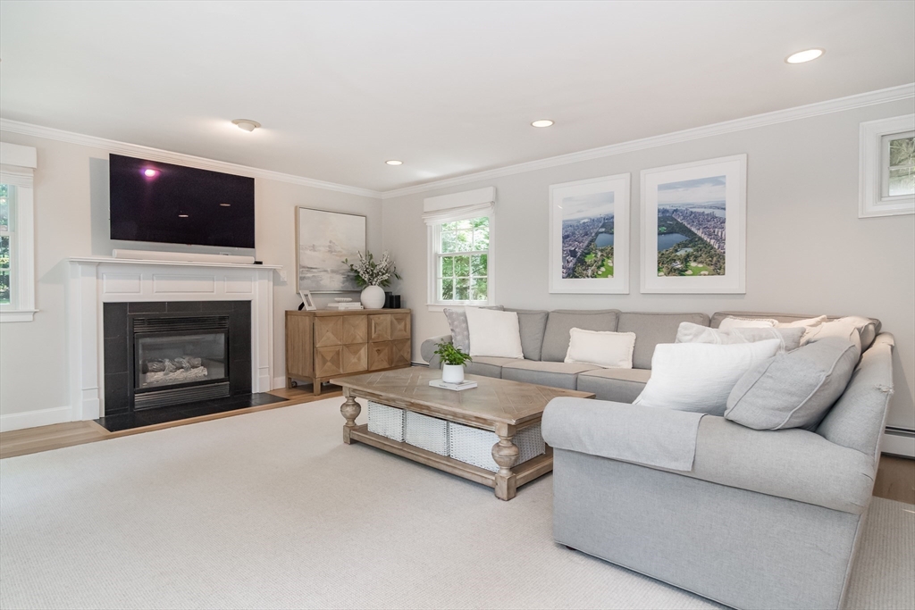 31 Martin Road Wellesley, MA 02481 - Photo 12 of 28 a living room with furniture fireplace and flat screen tv