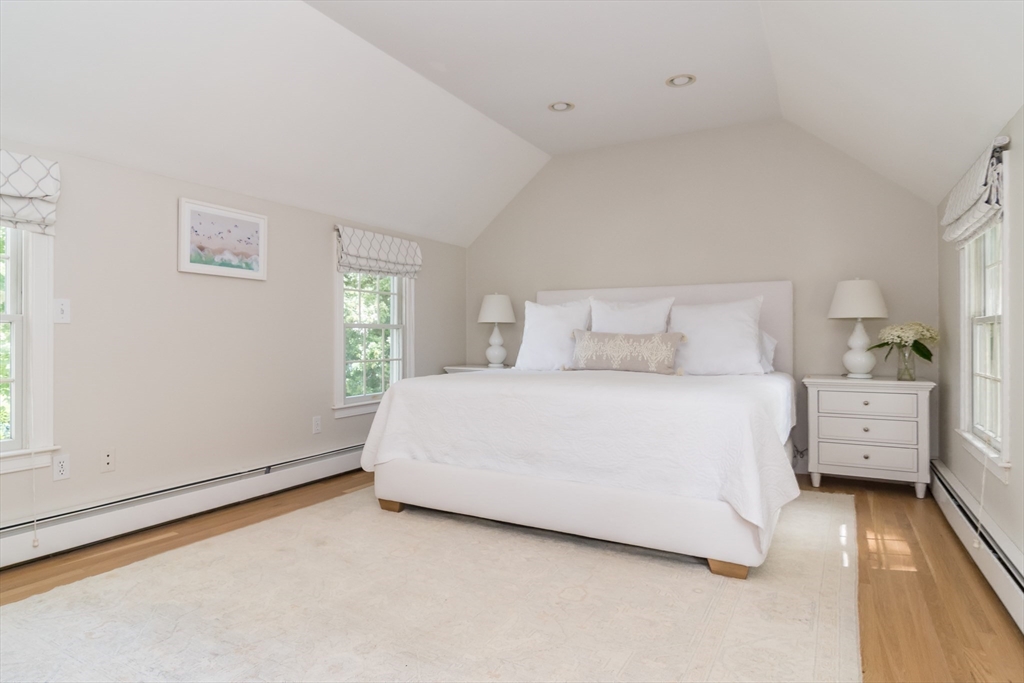 31 Martin Road Wellesley, MA 02481 - Photo 14 of 28 a room with a bed and a night stand