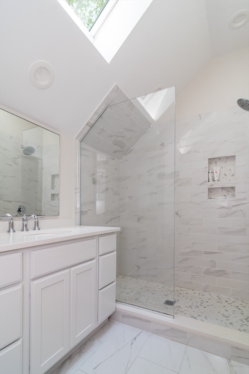 31 Martin Road Wellesley, MA 02481 - Photo 16 of 28 a bathroom with a sink and mirror