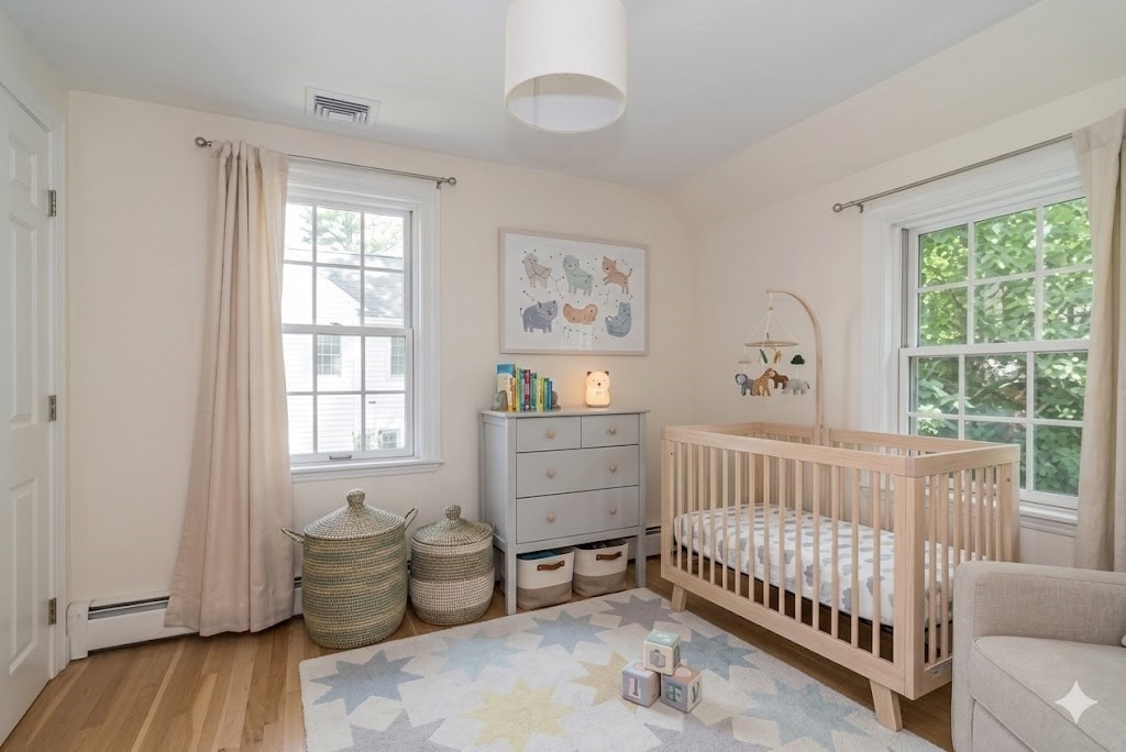 31 Martin Road Wellesley, MA 02481 - Photo 19 of 28 a bedroom with furniture and a window