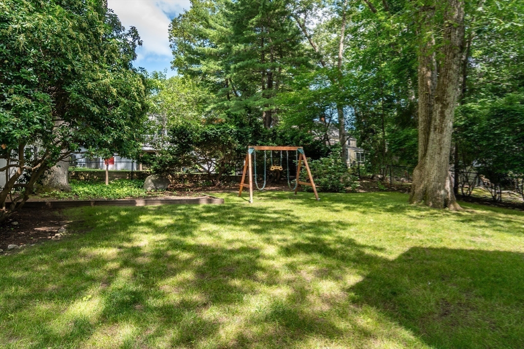 31 Martin Road Wellesley, MA 02481 - Photo 24 of 28 a view of a backyard with a garden