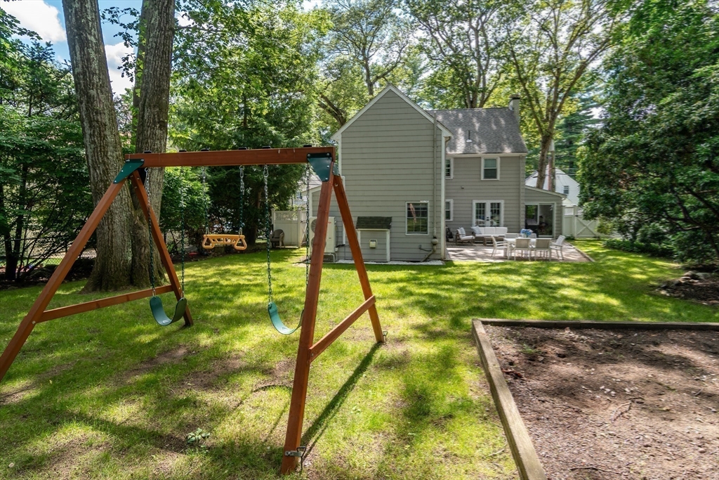 31 Martin Road Wellesley, MA 02481 - Photo 26 of 28 a view of a house with swimming pool