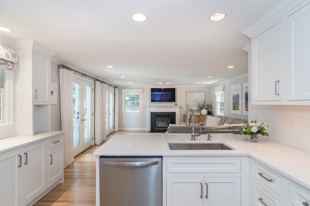 31 Martin Road Wellesley, MA 02481 - Photo 8 of 28 a kitchen with a sink and cabinets