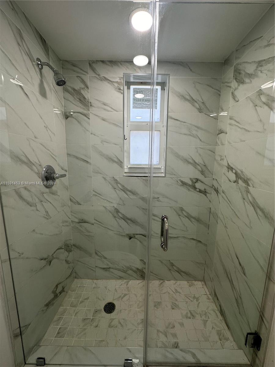 502 Southwest 27th Avenue, Unit 4 Miami, FL 33135 - Photo 9 of 11 a bathroom with a shower
