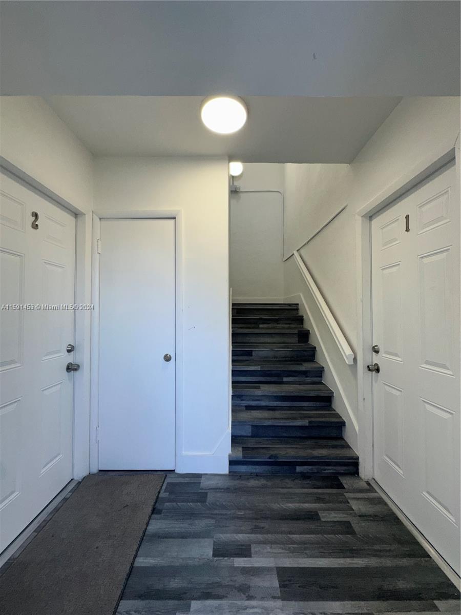 502 Southwest 27th Avenue, Unit 4 Miami, FL 33135 - Photo 10 of 11 a view of entryway and hall with wooden floor