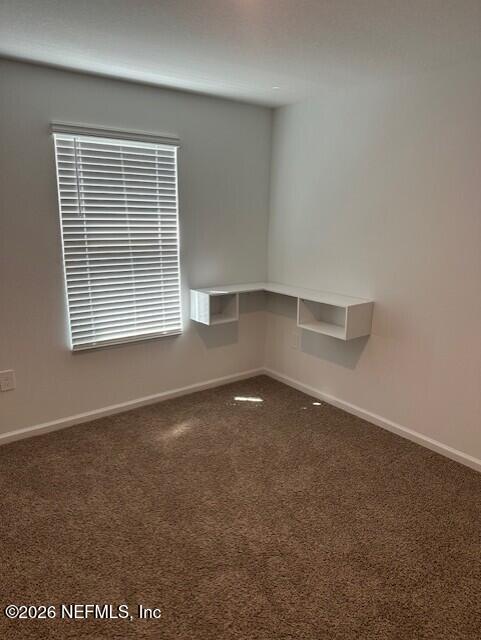 915 Rivertree Place Middleburg, FL 32068 - Photo 17 of 23 a view of an empty room with a window