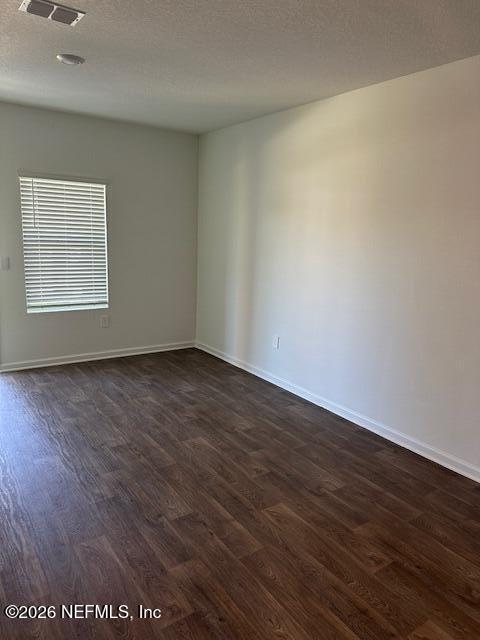 915 Rivertree Place Middleburg, FL 32068 - Photo 6 of 23 an empty room with wooden floor and windows