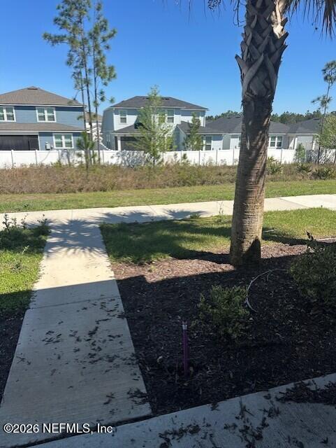 915 Rivertree Place Middleburg, FL 32068 - Photo 9 of 23 a view of a yard with an ocean view