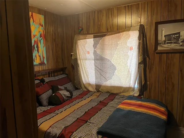 a kitchen with a refrigerator and a sink