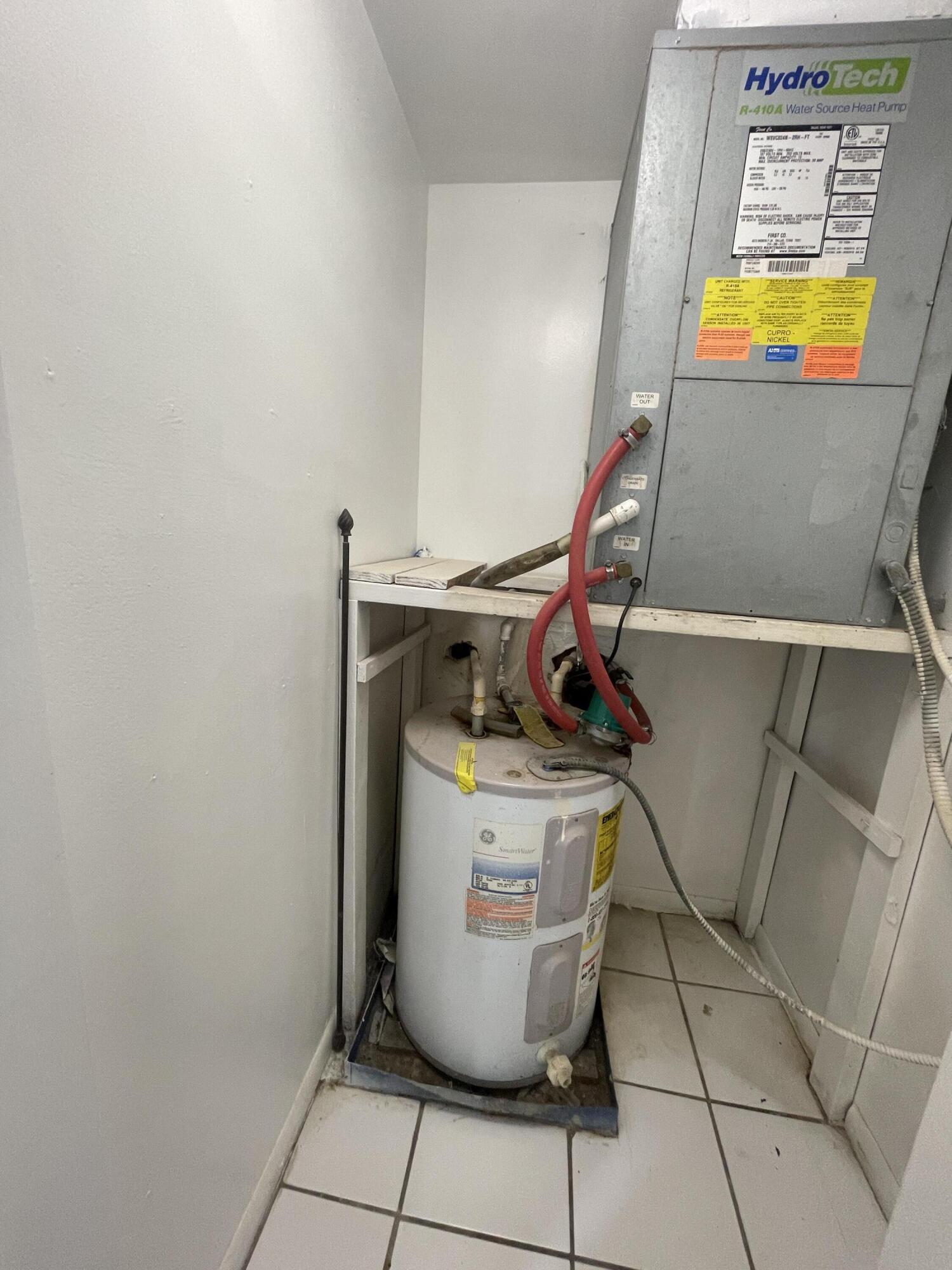 636 Northwest 13th Street, Unit 380 Boca Raton, FL 33486 - Photo 13 of 14 a utility room with dryer and washer