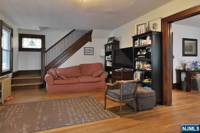 71 Everett Street Closter, NJ 07624 - Photo 3 of 12 a living room with furniture and a flat screen tv