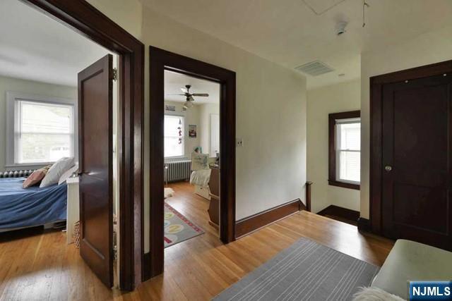 71 Everett Street Closter, NJ 07624 - Photo 8 of 12 a view of a bedroom from a hallway