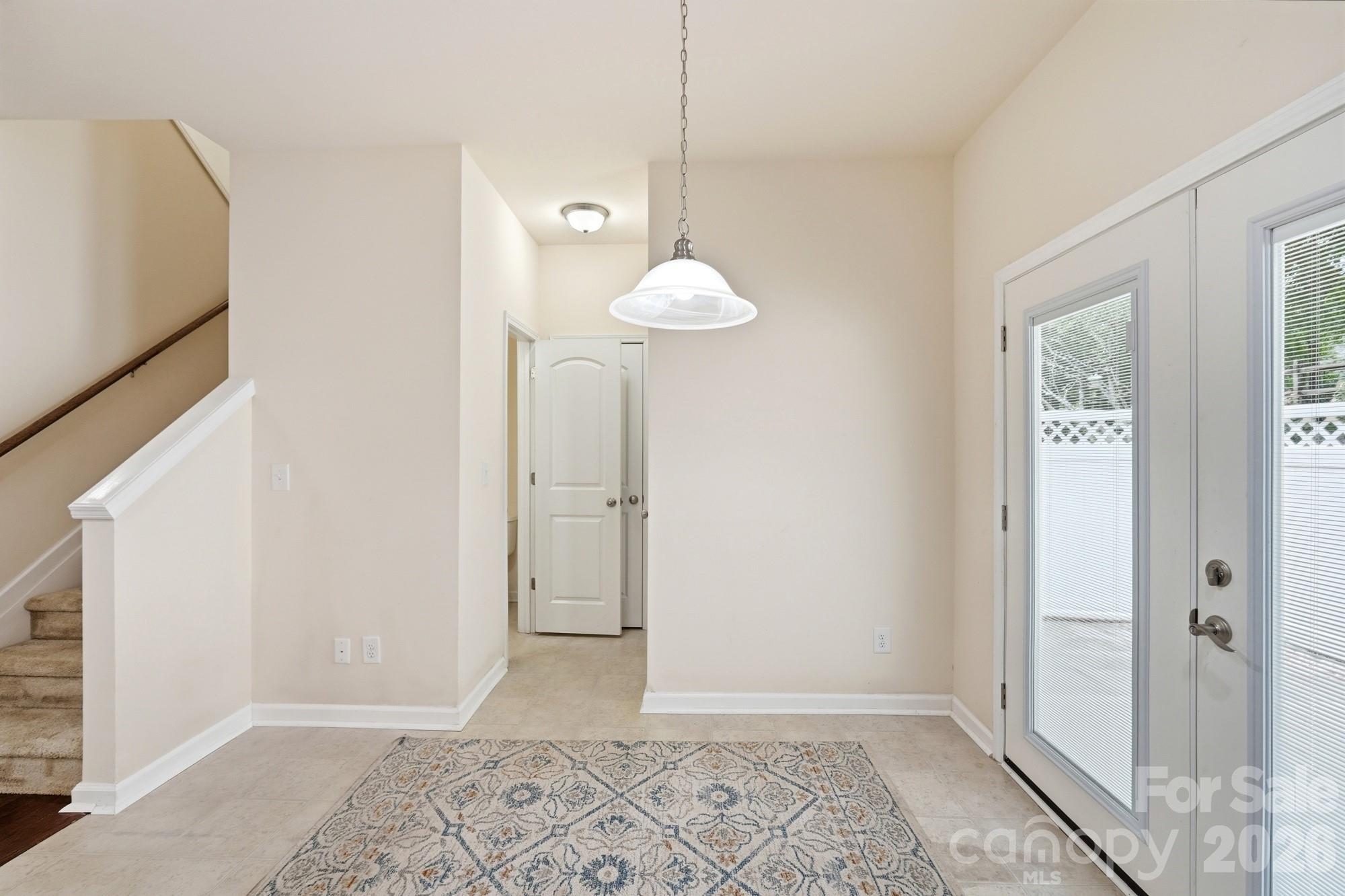 175 Limerick Road, Unit B Mooresville, NC 28115 - Photo 12 of 30 a view of a room with wooden floor and cabinet