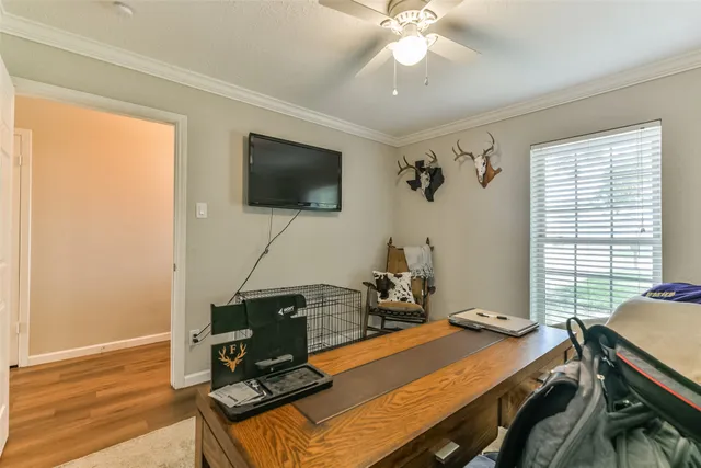 a view of a workspace with furniture