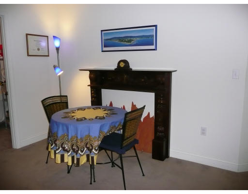 200 Market Street, Unit 3305 Lowell, MA 01852 - Photo 6 of 7 a dining room with furniture and wooden floor