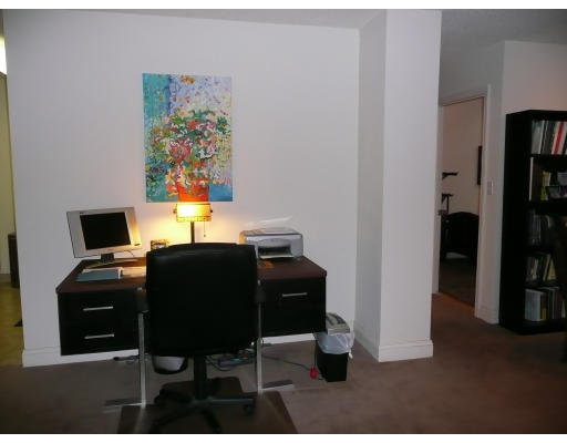200 Market Street, Unit 3305 Lowell, MA 01852 - Photo 7 of 7 a view of a workspace with furniture and lamp