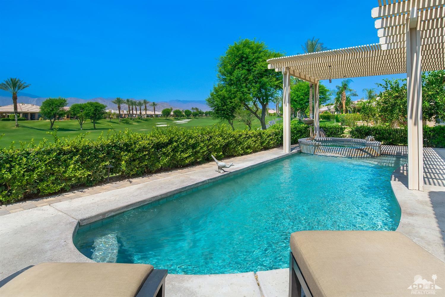 80561 Knightswood Road Indio, CA 92201 - Photo 1 of 25 a view of a backyard with sitting area
