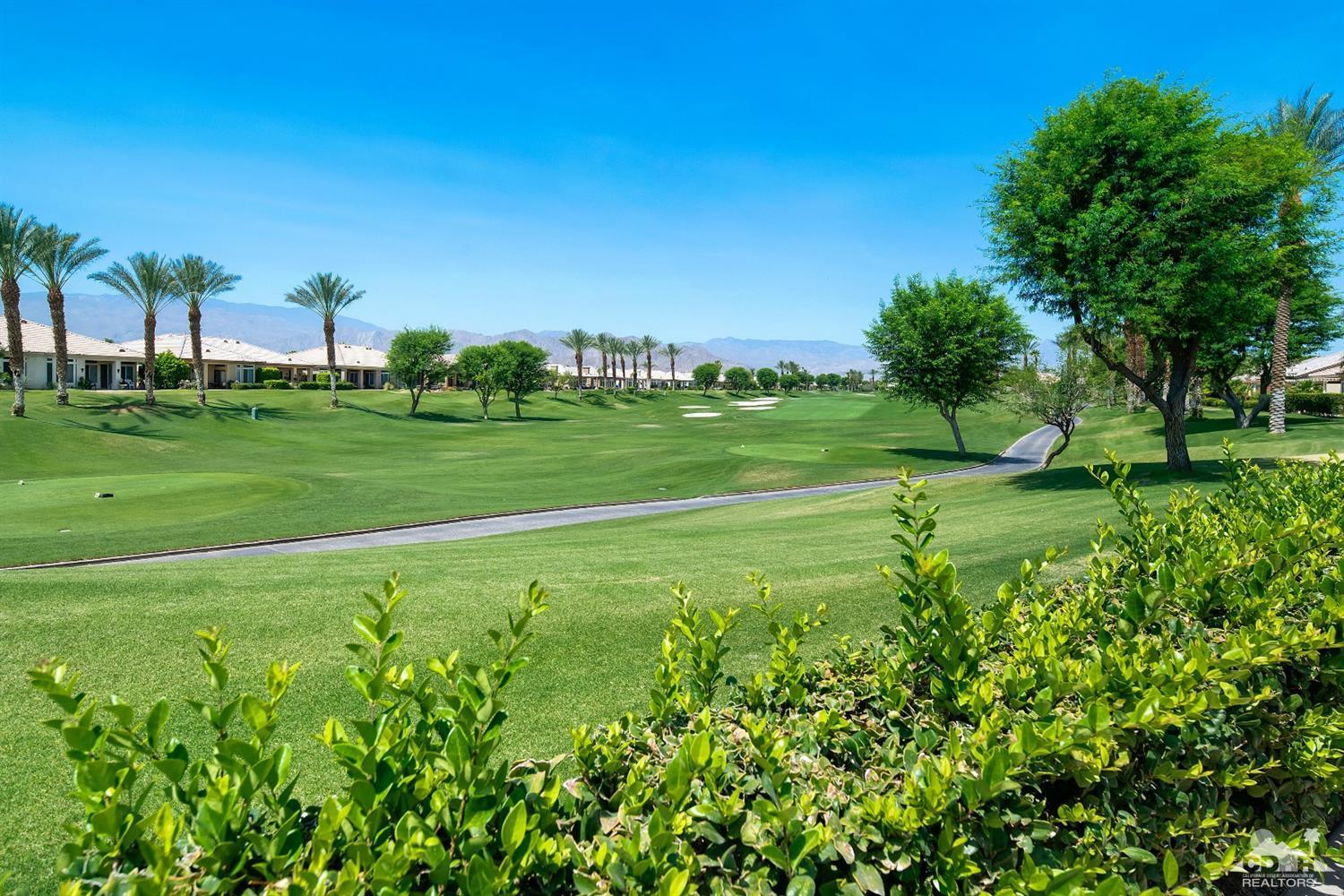 80561 Knightswood Road Indio, CA 92201 - Photo 18 of 25 a view of a golf course with a garden