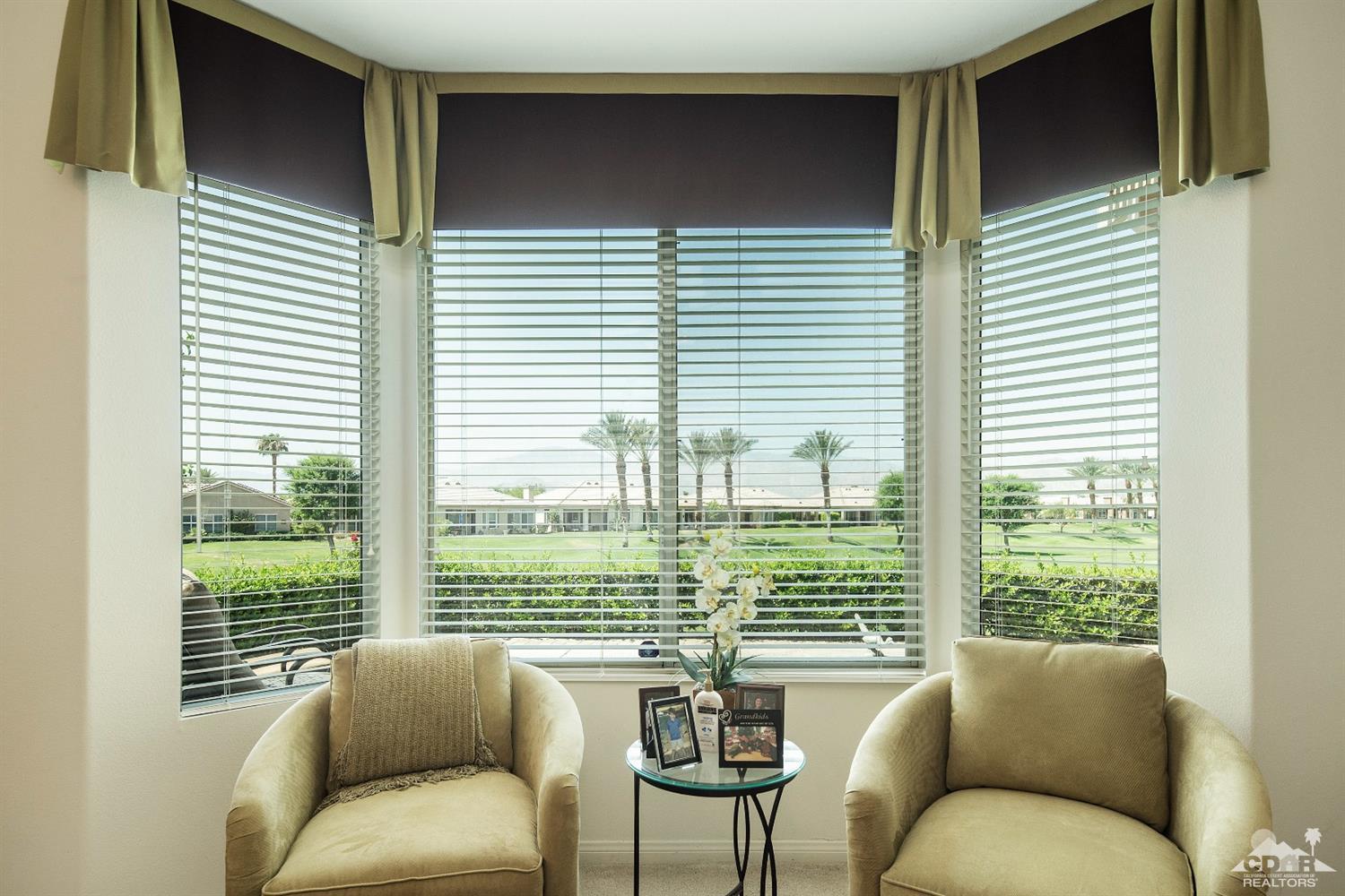 80561 Knightswood Road Indio, CA 92201 - Photo 10 of 25 a living room with furniture and a window