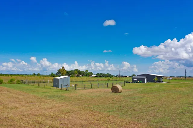 a view of a balcony with an ocean