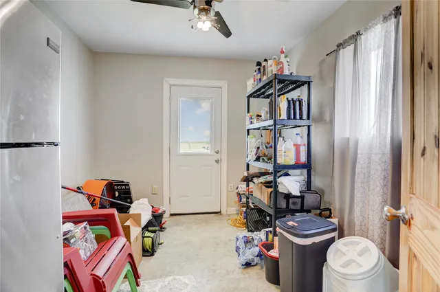 a room with storage and utility racks