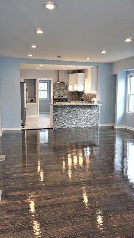 49 Ranney Street Springfield, MA 01108 - Photo 19 of 29 a view of a living room with kitchen island