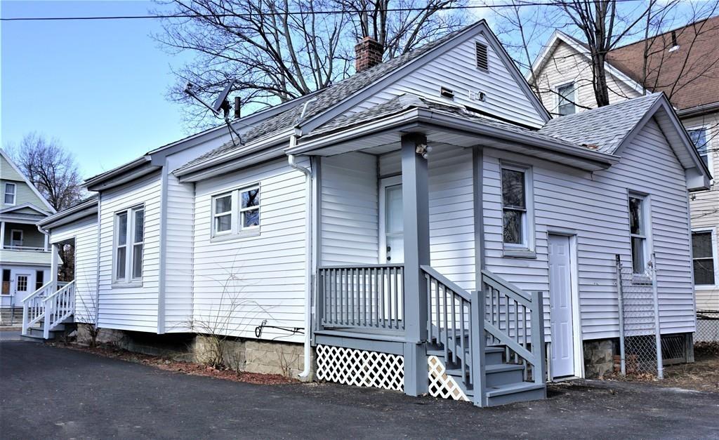 49 Ranney Street Springfield, MA 01108 - Photo 26 of 29 a small white building with a white roof and a small barn
