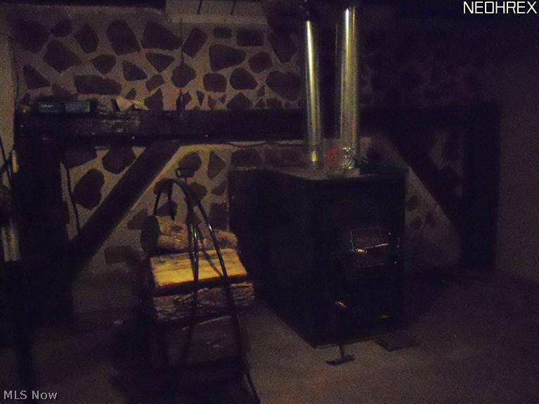 43162 Webster Road Wellington, OH 44090 - Photo 9 of 17 2nd wood burner in the basement/family room
