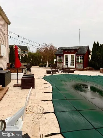 a view of multiple houses with yard