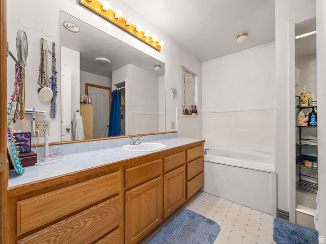 598 West 1600th Street North Mapleton, UT 84664 - Photo 12 of 34 Full bath with vanity, light flooring, and a bath