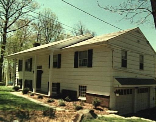 167 Linden Tree Road Wilton, CT 06897 - Photo 1 of 1 a front view of a house with a yard