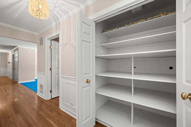 a view of an empty walk in closet