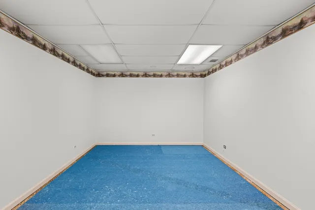 a view of a room with racks on the wall