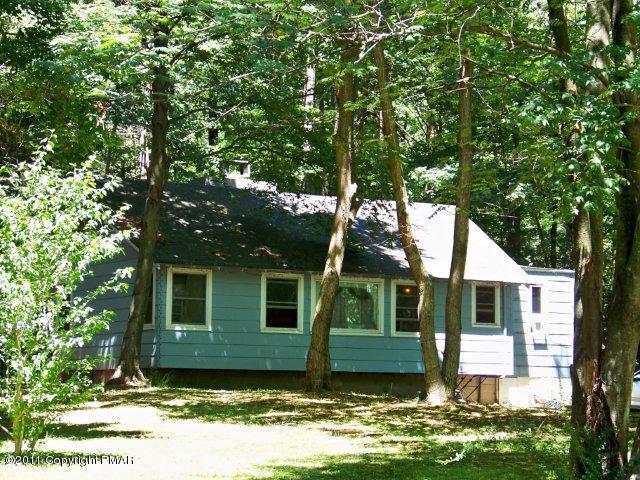 362 Camelback Road Tannersville, PA 18372 - Photo 13 of 13 a view of a yard in front of a house with large tree