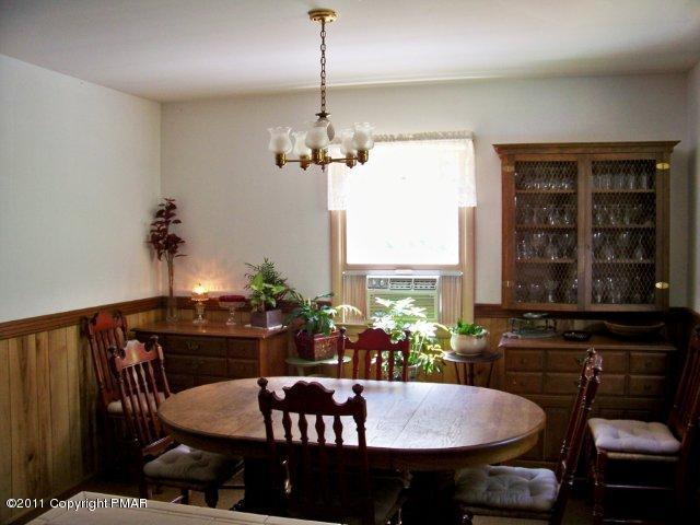 362 Camelback Road Tannersville, PA 18372 - Photo 2 of 13 a view of a dining room with furniture window and outside view