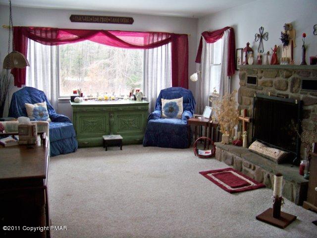 362 Camelback Road Tannersville, PA 18372 - Photo 8 of 13 a living room with furniture and a large window