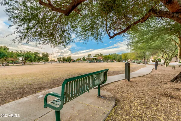 a view of pathway with a yard