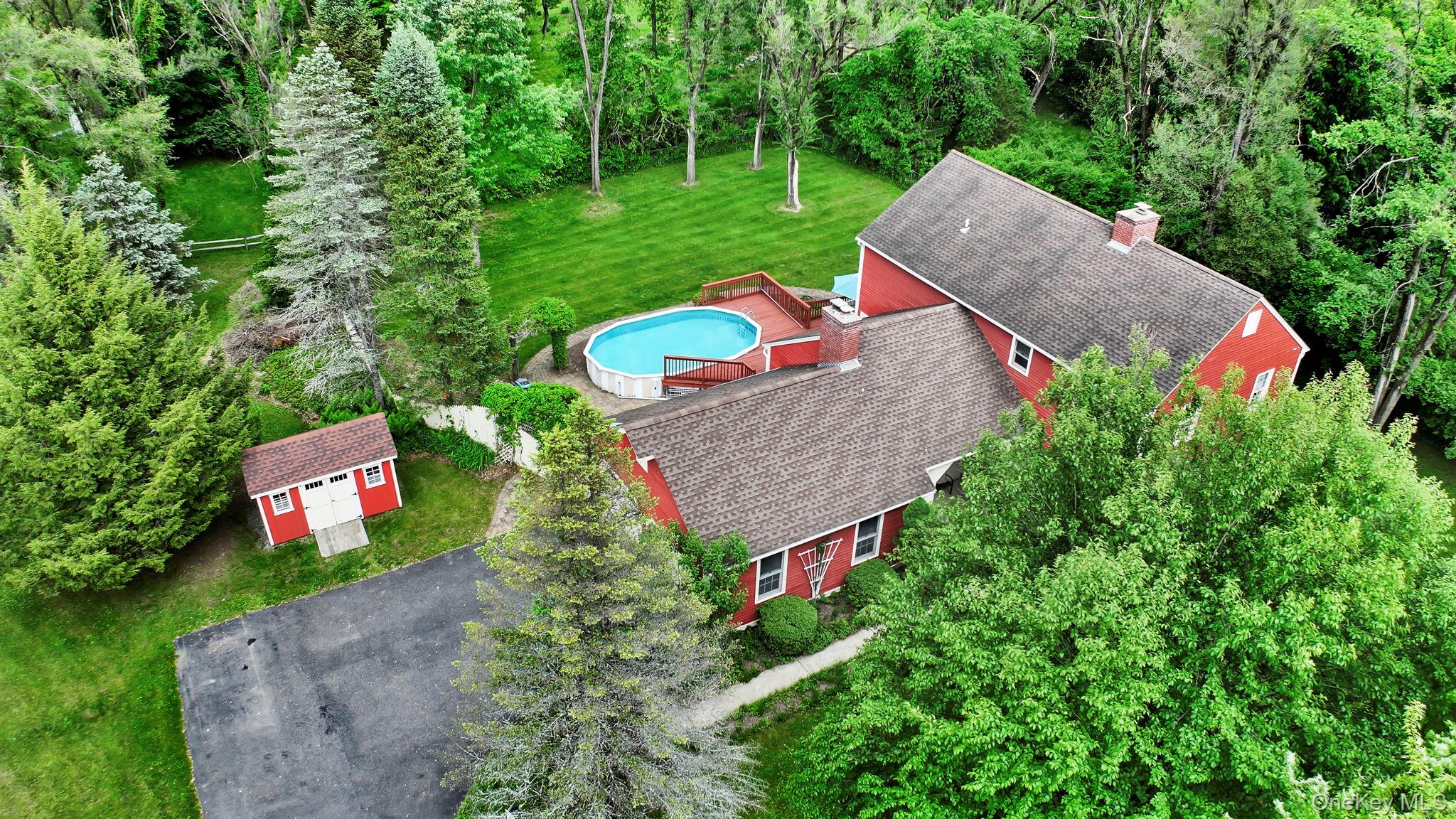 74 Vincent Lane Stone Ridge, NY 12484 - Photo 1 of 49 an aerial view of a house with pool yard and outdoor seating