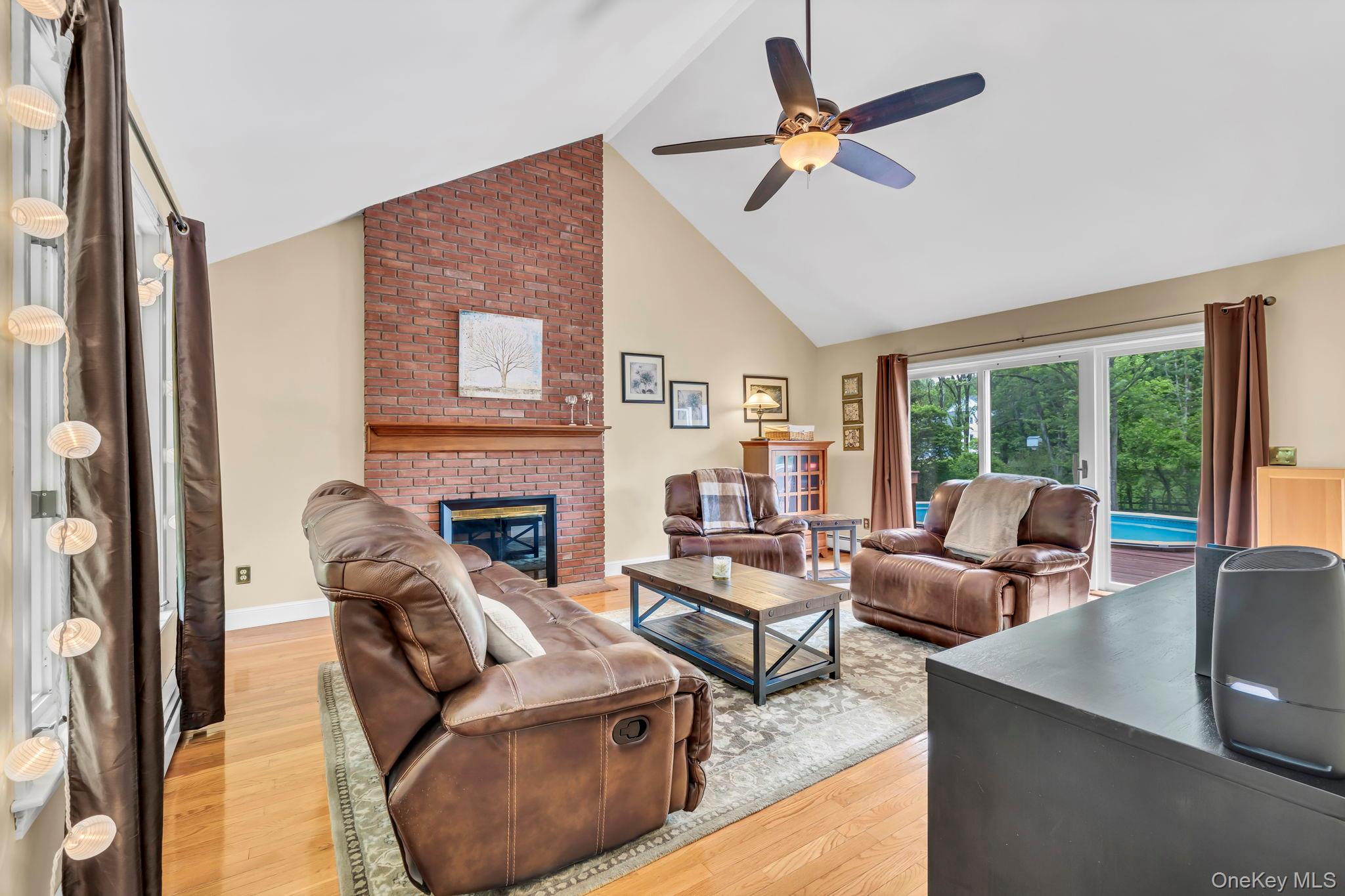 74 Vincent Lane Stone Ridge, NY 12484 - Photo 19 of 49 a living room with furniture and a large window