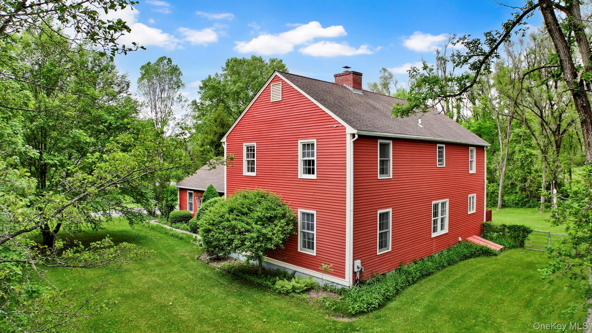 74 Vincent Lane Stone Ridge, NY 12484 - Photo 3 of 49 a view of a house with a yard and plants