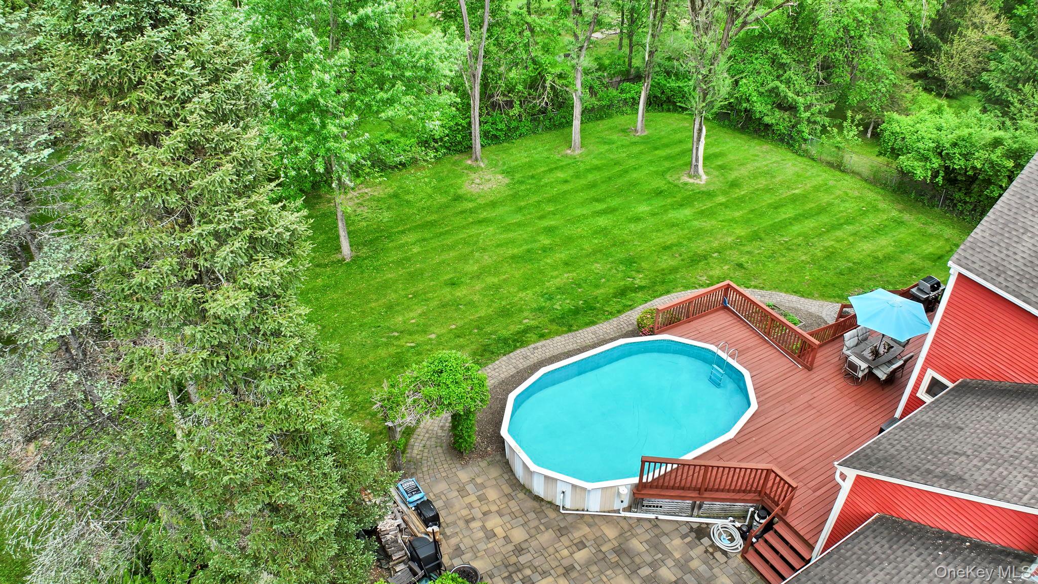 74 Vincent Lane Stone Ridge, NY 12484 - Photo 39 of 49 an aerial view of a house with a swimming pool and garden