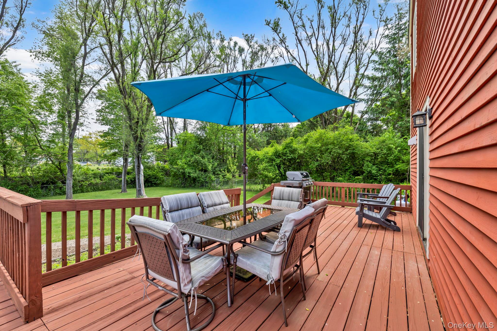 74 Vincent Lane Stone Ridge, NY 12484 - Photo 42 of 49 a view of balcony with outdoor seating and wooden floor